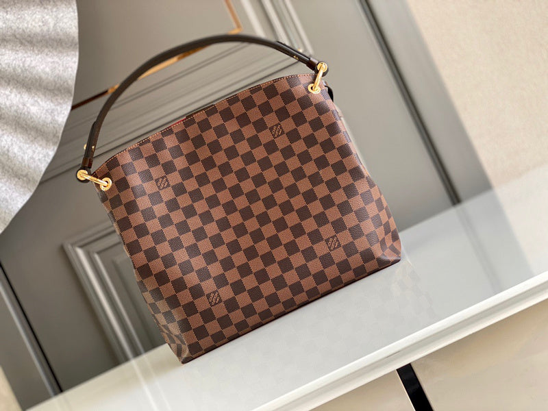 Close-up detail of signature sleek women's handbag – women's luxury handbag