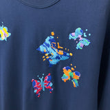 Full styled look of Louis Vuitton luxury clothing with label-forward styling