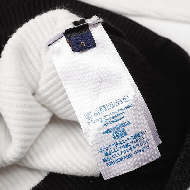 Close-up detail shot of Louis Vuitton luxury clothing with runway-inspired design