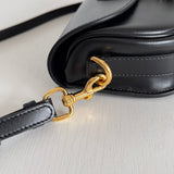 Handle and strap detail of premium sleek women's handbag – women's luxury accessory