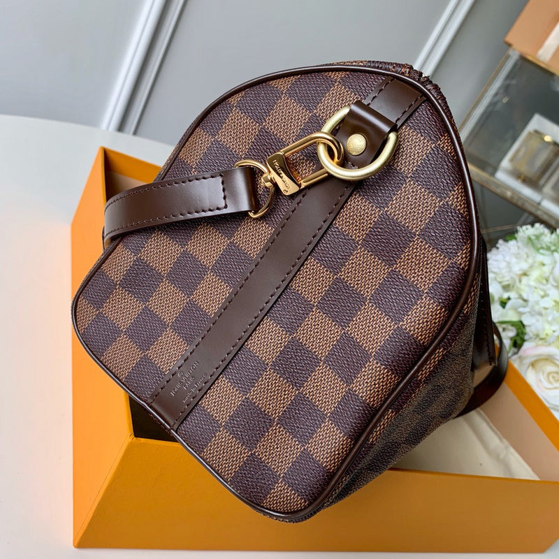 Front view of polished signature women's handbag – women's luxury handbag