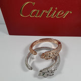 Side view of Cartier unisex jewelry piece