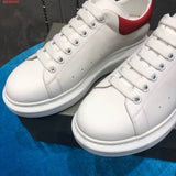 Alexander McQueen neutral cream luxury sneakers view 5 minimalist modern build