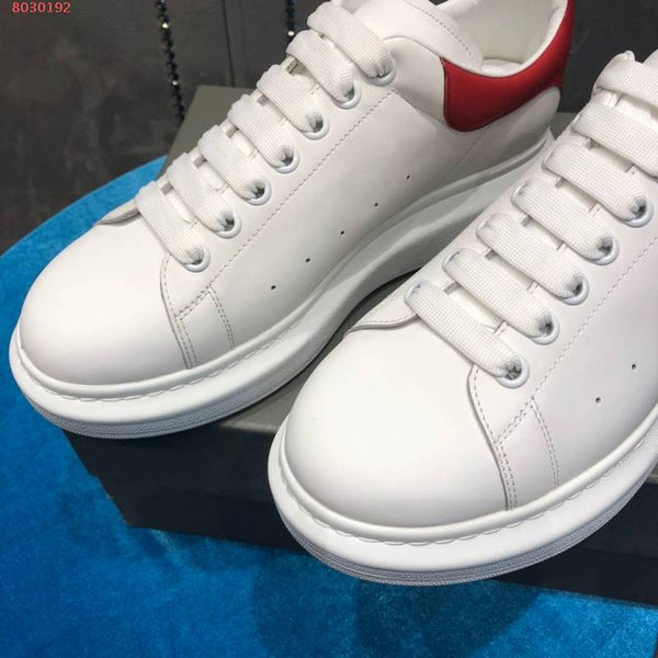 Alexander McQueen neutral cream luxury sneakers view 5 minimalist modern build
