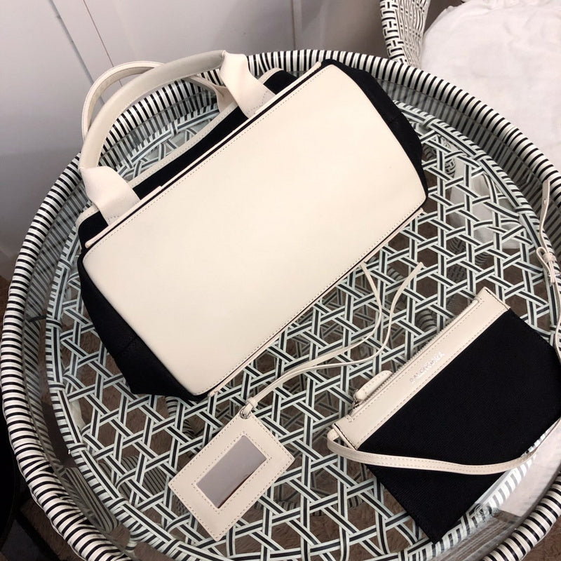 Close-up detail of modern sleek women's handbag – women's designer-style accessory