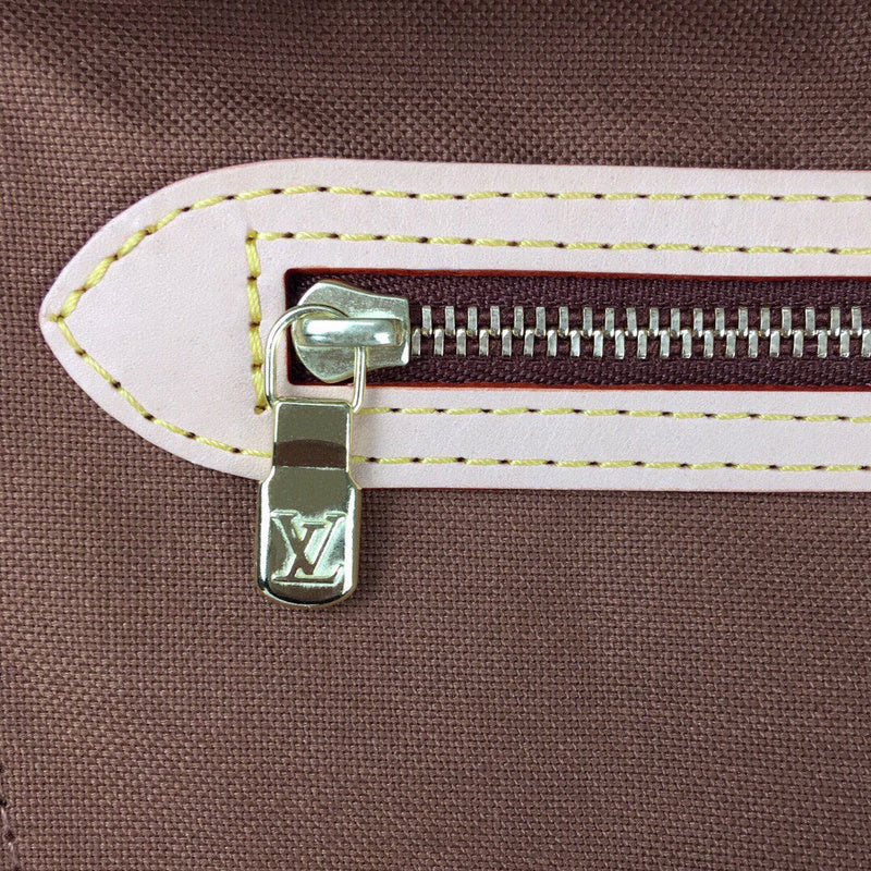 Front view of signature polished women's handbag – women's luxury handbag