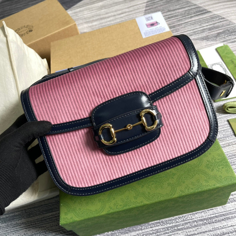 Handle and strap detail of signature polished women's handbag – women's luxury accessory