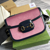 Handle and strap detail of signature polished women's handbag – women's luxury accessory
