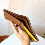 Styled lifestyle shot of refined structured women's handbag – women's everyday handbag