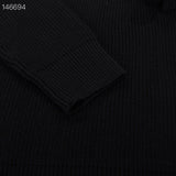 Flat lay presentation of Louis Vuitton luxury clothing with relaxed-fit cut
