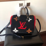 Side profile of classic polished women's handbag – women's premium purse