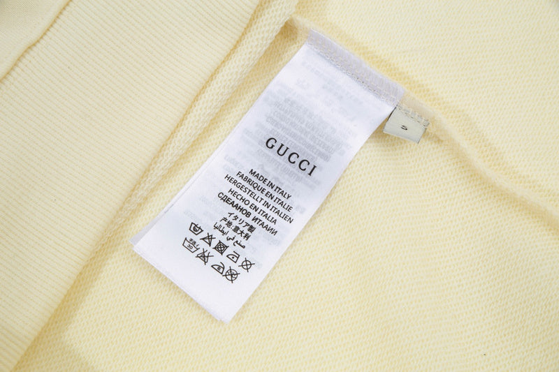 Close-up detail shot of Gucci luxury clothing with everyday silhouette