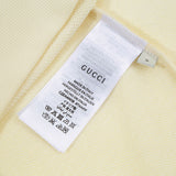 Close-up detail shot of Gucci luxury clothing with everyday silhouette