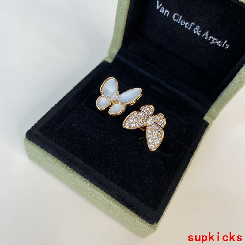 Lifestyle view of Van Cleef & Arpels unisex jewelry piece
