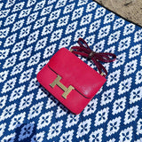 Side view of refined structured handbag