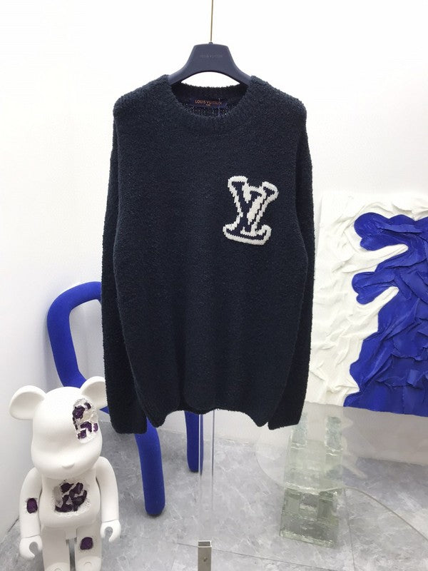 Side profile of Louis Vuitton luxury clothing with label-forward styling