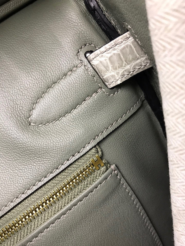 Side view of structured structured handbag
