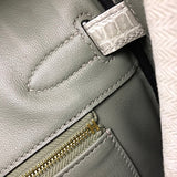 Side view of structured structured handbag