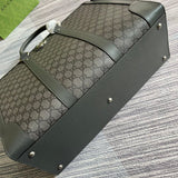 Styled lifestyle shot of sleek classic women's handbag – women's designer-style accessory