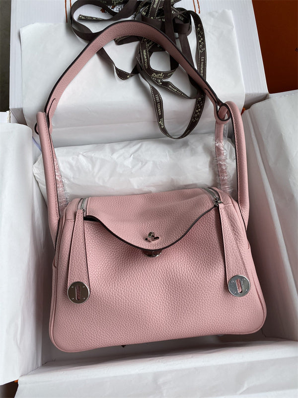 Side view of polished structured handbag