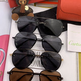 Close-up detail view of Cartier unisex sunglasses