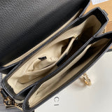 Side profile of everyday-luxe sleek women's handbag – women's statement bag