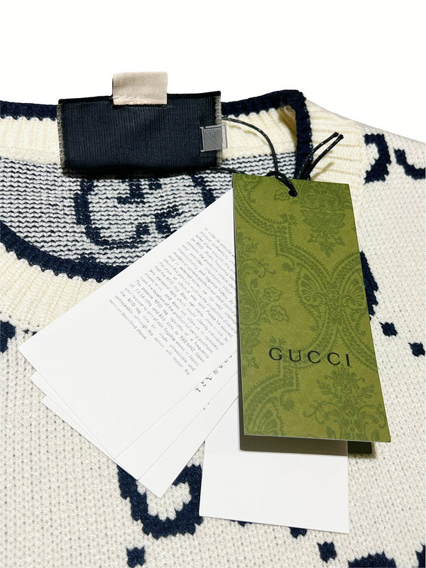 Flat lay presentation of Gucci luxury clothing with relaxed-fit cut
