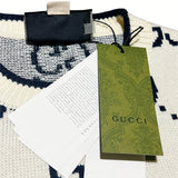 Flat lay presentation of Gucci luxury clothing with relaxed-fit cut