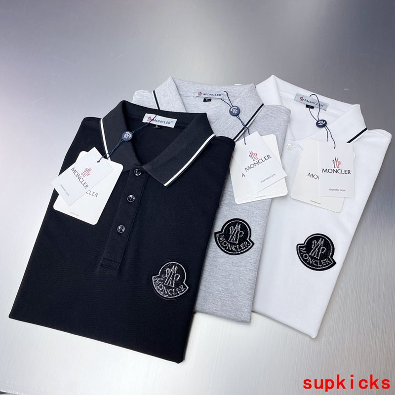 Close-up detail shot of Moncler luxury clothing with logo-detail design