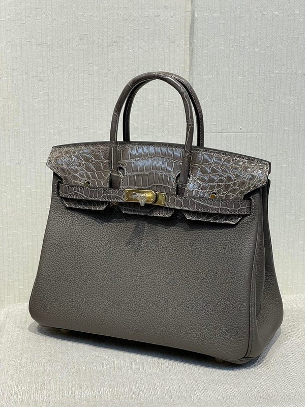 Side view of curated structured handbag