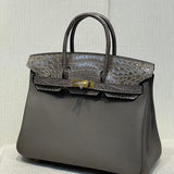 Side view of curated structured handbag
