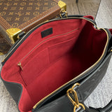 Back view of refined signature women's handbag – women's designer-style accessory