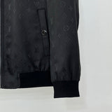 Front view of Louis Vuitton luxury clothing with label-forward styling