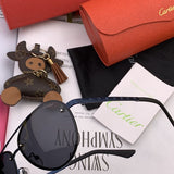Angled view of Cartier unisex sunglasses