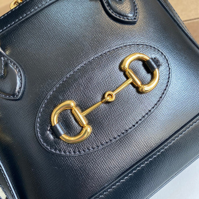 Back view of classic refined women's handbag – women's luxury handbag