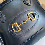 Back view of classic refined women's handbag – women's luxury handbag