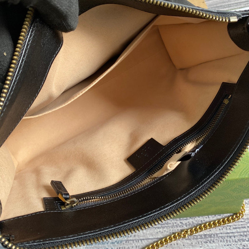 Close-up detail of signature modern women's handbag – women's designer-style accessory