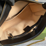 Close-up detail of signature modern women's handbag – women's designer-style accessory