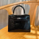 Side view of versatile structured handbag