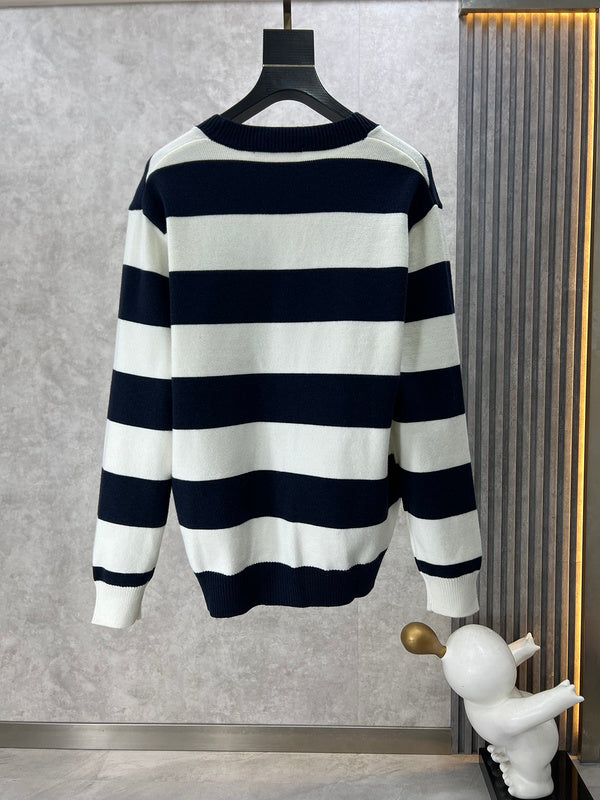 Side profile of Louis Vuitton luxury clothing with label-forward styling