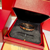 Close-up detail view of Cartier unisex jewelry piece