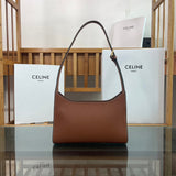 Handle and strap detail of sleek refined women's handbag – women's luxury handbag