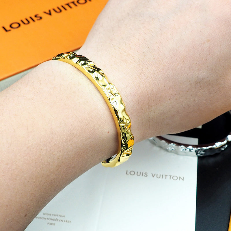 Close-up detail view of Cartier unisex jewelry piece