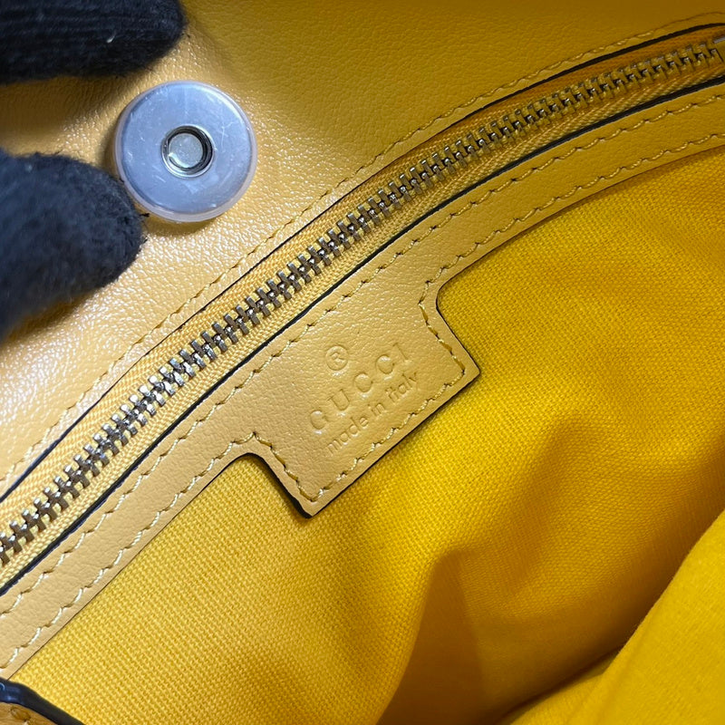 Side profile of classic refined women's handbag – women's designer-style accessory