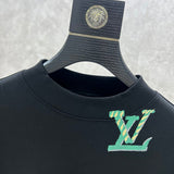 Full styled look of Louis Vuitton luxury clothing with monogram-inspired silhouette