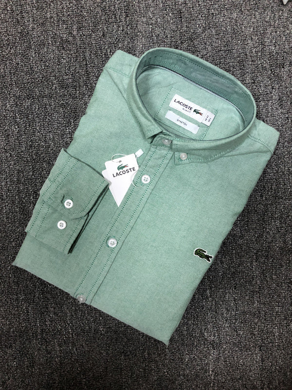 Close-up detail shot of Lacoste luxury clothing with logo-detail design