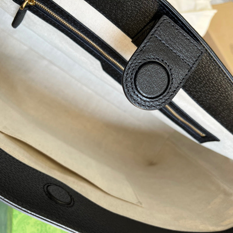 Side profile of signature sleek women's handbag – women's luxury accessory