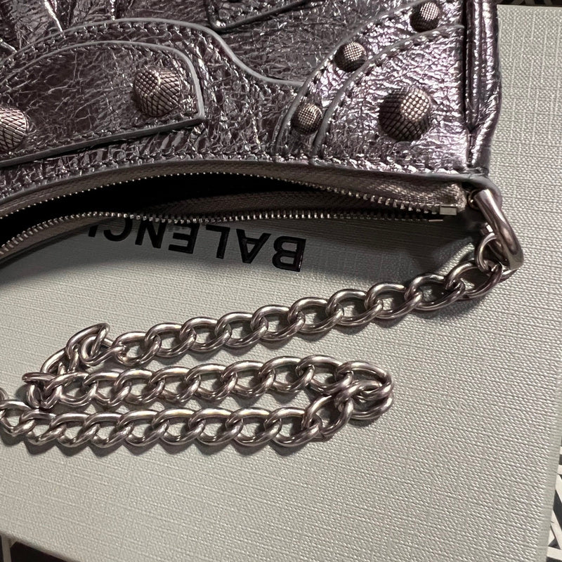 Side profile of refined sleek women's handbag – women's statement bag