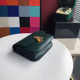 Styled lifestyle shot of polished elevated women's handbag – women's statement bag