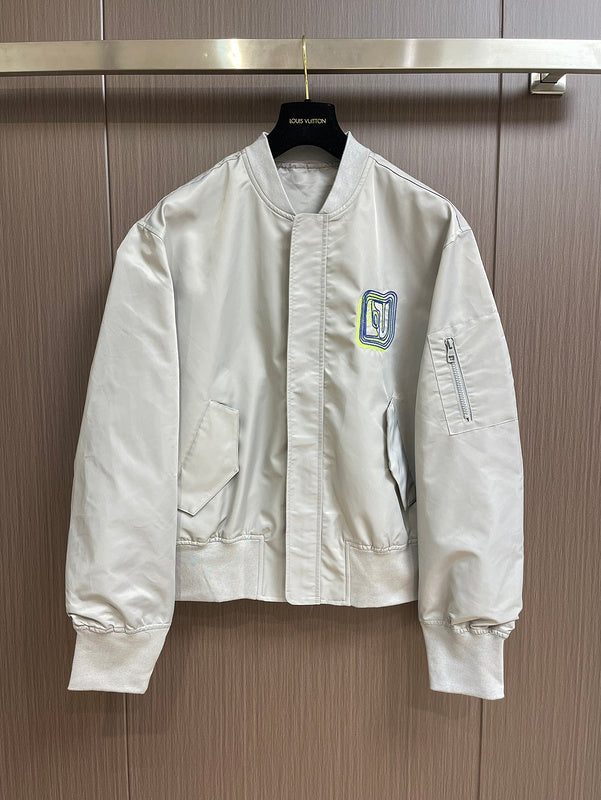 Back view of Louis Vuitton luxury clothing with label-forward styling